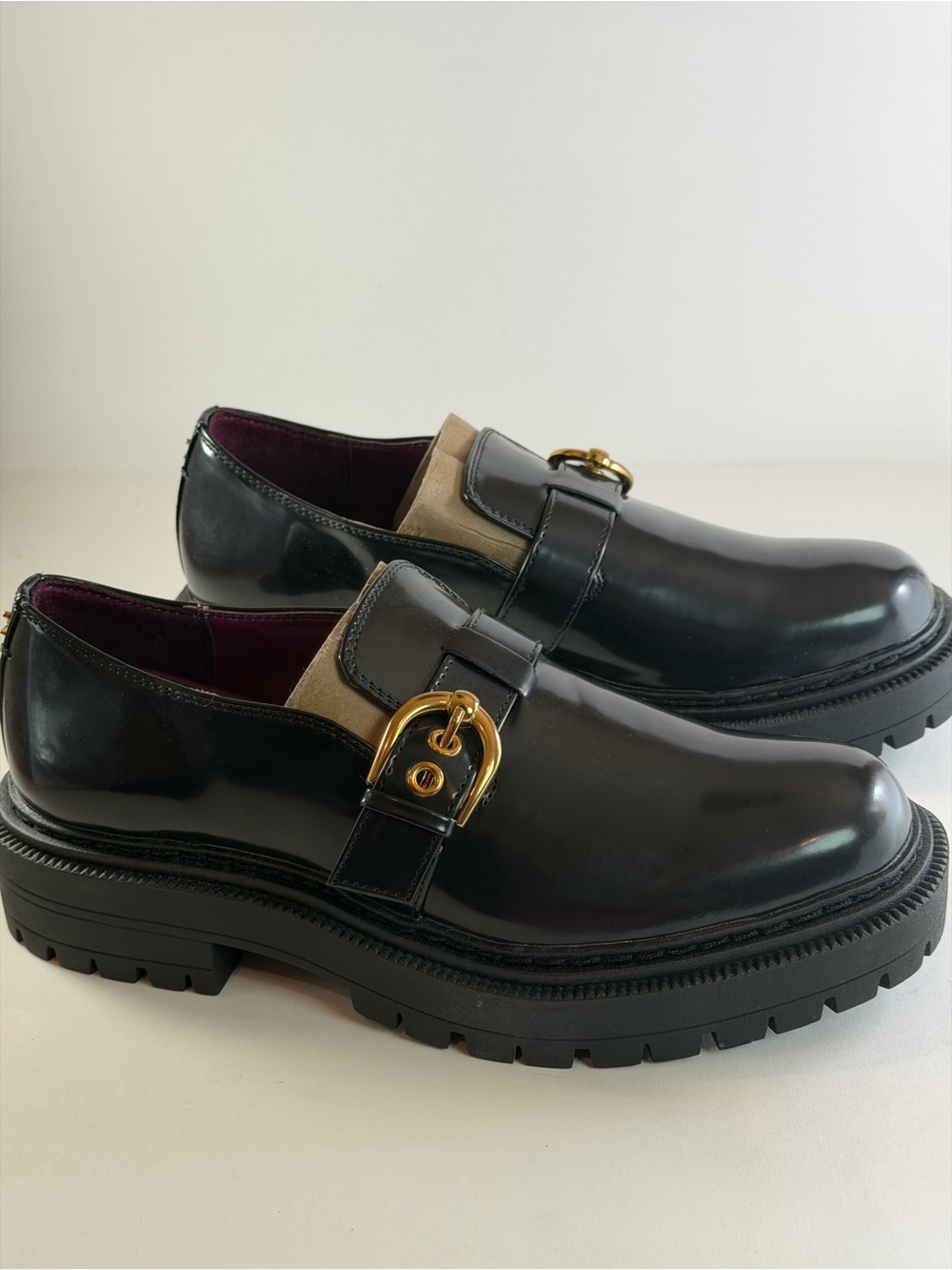 Black Leather Lug Sole Loafers with Gold Buckle